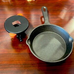 Wax melt cast iron skillet with tea light holder.